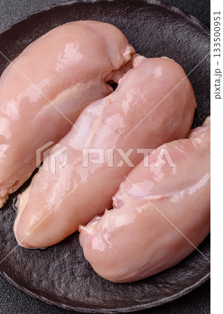 Raw chicken or turkey breast, skinless and boneless. Chicken breast Raw chicken or turkey breast, skinless and boneless. Chicken breast 133500951