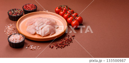 Slices of raw chicken or turkey breast, skinless and boneless. Chicken breast slices Slices of raw chicken or turkey breast, skinless and boneless. Chicken breast slices 133500987