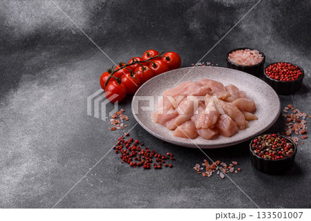 Strips of raw chicken or turkey fillet, skinless and boneless poultry breast. Chicken fillet strips Strips of raw chicken or turkey fillet, skinless and boneless poultry breast. Chicken fillet strips 133501007