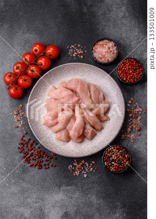 Strips of raw chicken or turkey fillet, skinless and boneless poultry breast. Chicken fillet strips 133501009