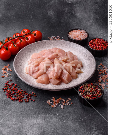 Strips of raw chicken or turkey fillet, skinless and boneless poultry breast. Chicken fillet strips 133501010