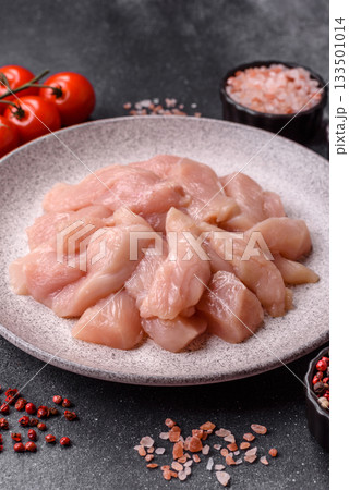 Strips of raw chicken or turkey fillet, skinless and boneless poultry breast. Chicken fillet strips 133501014