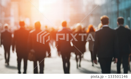 Busy Urban Crowd Walking in a Modern City Street with Warm Sunset Light Morning Rush 133501146