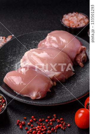 Raw chicken thigh fillet, poultry meat as a source of protein. Chicken thigh fillet Raw chicken thigh fillet, poultry meat as a source of protein. Chicken thigh fillet 133501293