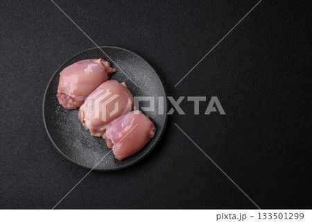 Raw chicken thigh fillet, poultry meat as a source of protein. Chicken thigh fillet Raw chicken thigh fillet, poultry meat as a source of protein. Chicken thigh fillet 133501299