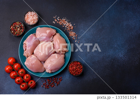Raw chicken thigh fillet, poultry meat as a source of protein. Chicken thigh fillet 133501314