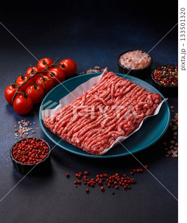 Raw ground beef or pork, prepared meat for burgers or other food preparation. Raw ground beef 133501320