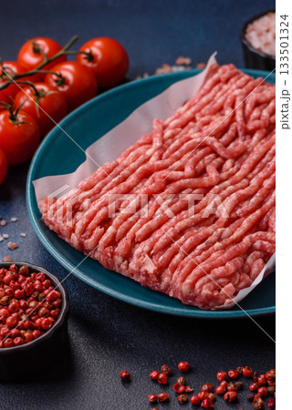 Raw ground beef or pork, prepared meat for burgers or other food preparation. Raw ground beef Raw ground beef or pork, prepared meat for burgers or other food preparation. Raw ground beef 133501324