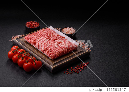 Raw ground beef or pork, prepared meat for burgers or other food preparation. Raw ground beef Raw ground beef or pork, prepared meat for burgers or other food preparation. Raw ground beef 133501347
