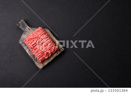 Raw ground beef or pork, prepared meat for burgers or other food preparation. Raw ground beef Raw ground beef or pork, prepared meat for burgers or other food preparation. Raw ground beef 133501364