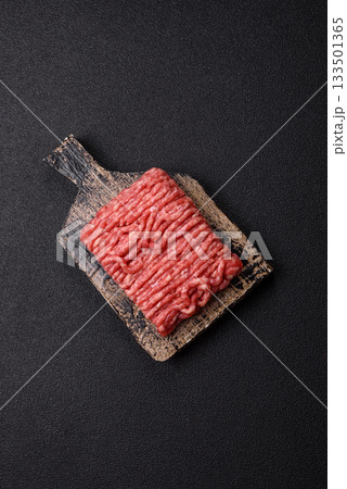 Raw ground beef or pork, prepared meat for burgers or other food preparation. Raw ground beef Raw ground beef or pork, prepared meat for burgers or other food preparation. Raw ground beef 133501365