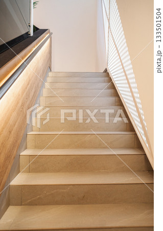 Stairs Ascending Towards Window 133501504