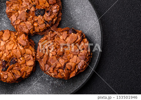 Chocolate chip cookies with caramelized nuts, a healthy sweet snack. Nut cookies Chocolate chip cookies with caramelized nuts, a healthy sweet snack. Nut cookies 133501946