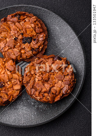 Chocolate chip cookies with caramelized nuts, a healthy sweet snack. Nut cookies Chocolate chip cookies with caramelized nuts, a healthy sweet snack. Nut cookies 133501947