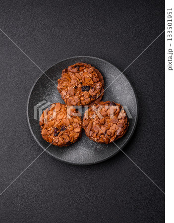 Chocolate chip cookies with caramelized nuts, a healthy sweet snack. Nut cookies Chocolate chip cookies with caramelized nuts, a healthy sweet snack. Nut cookies 133501951