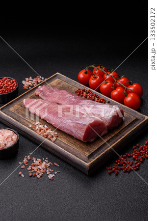 Raw pork tenderloin, fresh meat, a source of protein, and an ingredient for a meal. Pork tenderloin Raw pork tenderloin, fresh meat, a source of protein, and an ingredient for a meal. Pork tenderloin 133502172
