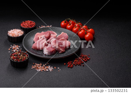 Raw pork tenderloin, sliced, is fresh meat, a source of protein. Pork tenderloin 133502231