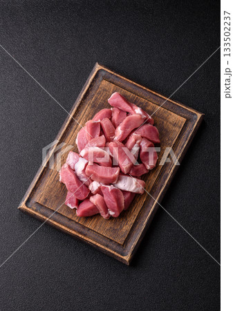 Raw pork, sliced, fresh meat, a source of protein, and an ingredient for a hearty meal. Raw pork Raw pork, sliced, fresh meat, a source of protein, and an ingredient for a hearty meal. Raw pork 133502237
