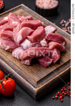 Raw pork, sliced, fresh meat, a source of protein, and an ingredient for a hearty meal. Raw pork Raw pork, sliced, fresh meat, a source of protein, and an ingredient for a hearty meal. Raw pork 133502246