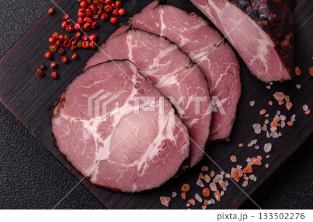 Ham, a meat cooked and sliced for sandwiches or Christmas table. Ham slices 133502276
