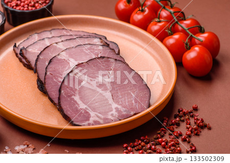 Ham, a meat cooked and sliced for sandwiches or Christmas table. Ham slices Ham, a meat cooked and sliced for sandwiches or Christmas table. Ham slices 133502309