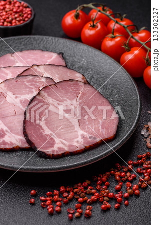 Ham, a meat cooked and sliced for sandwiches or Christmas table. Ham slices Ham, a meat cooked and sliced for sandwiches or Christmas table. Ham slices 133502327