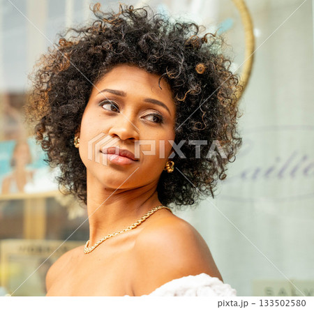 African-American woman looks to the side 133502580