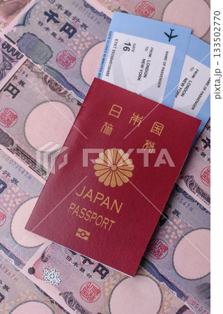 Japanese passport or id document with tickets for flight, travel, border crossing. Japan passport 133502770