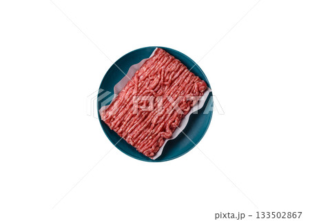 Raw ground beef or pork, prepared meat for burgers or other food preparation. Raw ground beef Raw ground beef or pork, prepared meat for burgers or other food preparation. Raw ground beef 133502867
