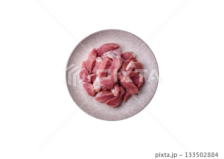 Raw pork, sliced, fresh meat, a source of protein, and an ingredient for a hearty meal. Raw pork 133502884