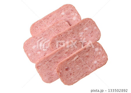 Spiced ham slices, canned meat for lunch sandwiches. Spiced ham as a food background Spiced ham slices, canned meat for lunch sandwiches. Spiced ham as a food background 133502892