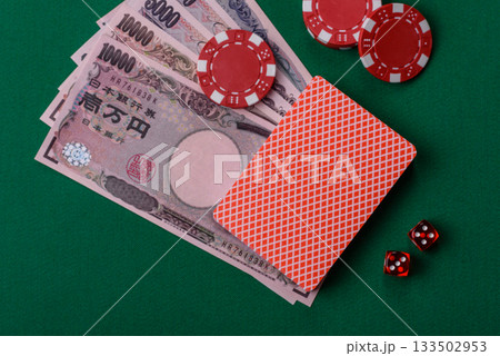 Casino game in the Japan, yen money, chips, cards. Gambling in casinos in the Japan 133502953