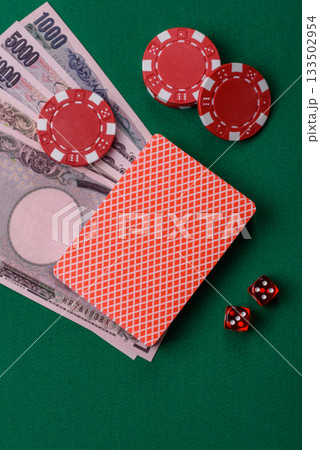 Casino game in the Japan, yen money, chips, cards. Gambling in casinos in the Japan Casino game in the Japan, yen money, chips, cards. Gambling in casinos in the Japan 133502954