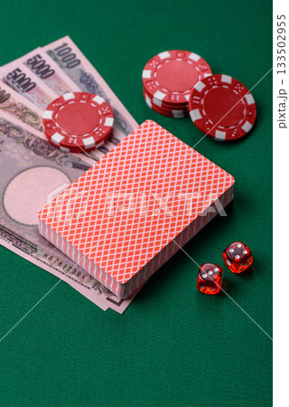 Casino game in the Japan, yen money, chips, cards. Gambling in casinos in the Japan 133502955