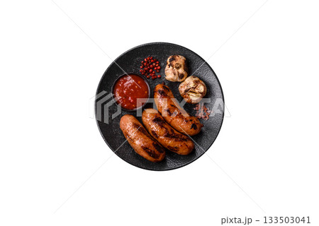 Grilled chicken or beef sausages with sauce and spices. Grilled sausages Grilled chicken or beef sausages with sauce and spices. Grilled sausages 133503041