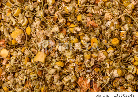 Dried chamomile flowers, herbal tea in a bowl for a hot morning drink. Dried chamomile 133503248