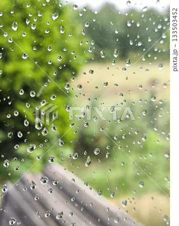 Raindrops on the window glass 133503452