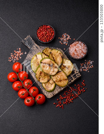 Grilled green zucchini slices, vegetarian food. Green barbecue zucchini 133503800