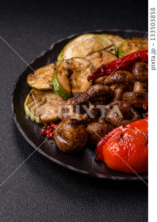 Grilled vegetables, bell peppers, mushrooms, and zucchini, a vegetarian meal. Grilled vegetables Grilled vegetables, bell peppers, mushrooms, and zucchini, a vegetarian meal. Grilled vegetables 133503858