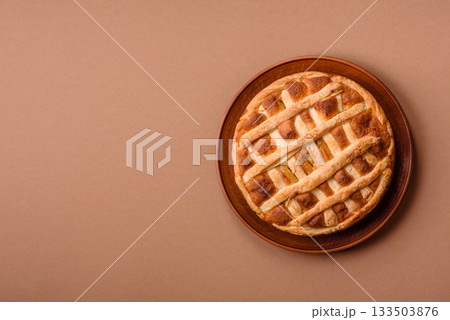 Sweet American pie with apples, pears, and cinnamon, a homemade dessert. Apple American pie 133503876