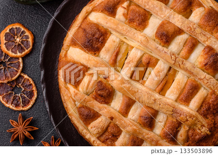 Sweet American pie with apples, pears, and cinnamon, a homemade dessert. Apple American pie 133503896