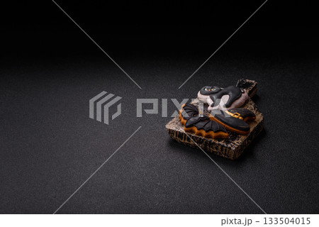 Halloween cookies, sweets, or gingerbread, a cat, a bat, and a hat. Halloween gingerbread 133504015