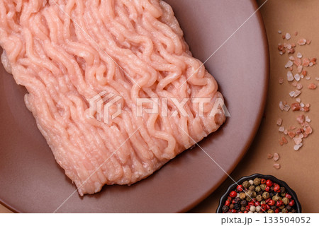 Raw minced chicken for a burger or as an ingredient in a meat dish. Raw ground chicken Raw minced chicken for a burger or as an ingredient in a meat dish. Raw ground chicken 133504052