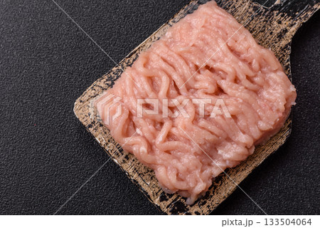 Raw minced chicken for a burger or as an ingredient in a meat dish. Raw ground chicken Raw minced chicken for a burger or as an ingredient in a meat dish. Raw ground chicken 133504064
