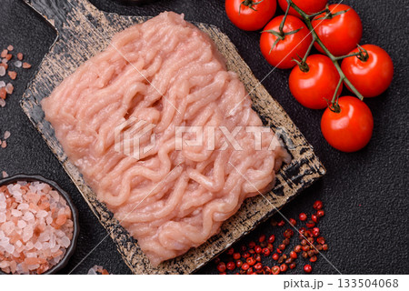 Raw minced chicken for a burger or as an ingredient in a meat dish. Raw ground chicken 133504068
