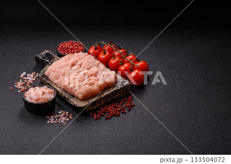 Raw minced chicken for a burger or as an ingredient in a meat dish. Raw ground chicken 133504072