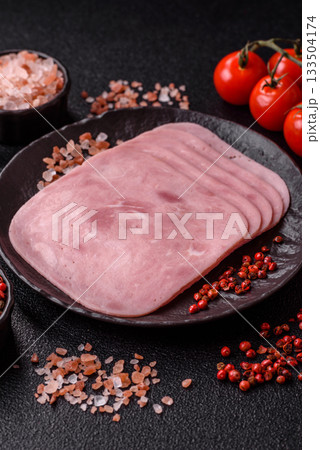 Meat, square ham sliced, organic food, protein for snacks. Sliced ham as a background 133504174