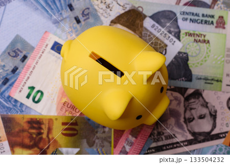 Paper money, banknotes of different countries as a business background. Paper money and cash 133504232