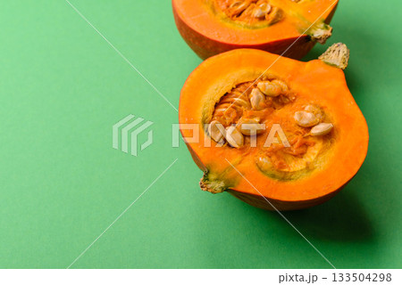Half a raw pumpkin, a ripe orange colored butternut squash. Raw pumpkin 133504298