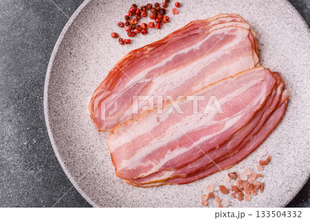 Meat, raw pork bacon sliced, organic food, protein for snacks. Raw bacon as a background 133504332